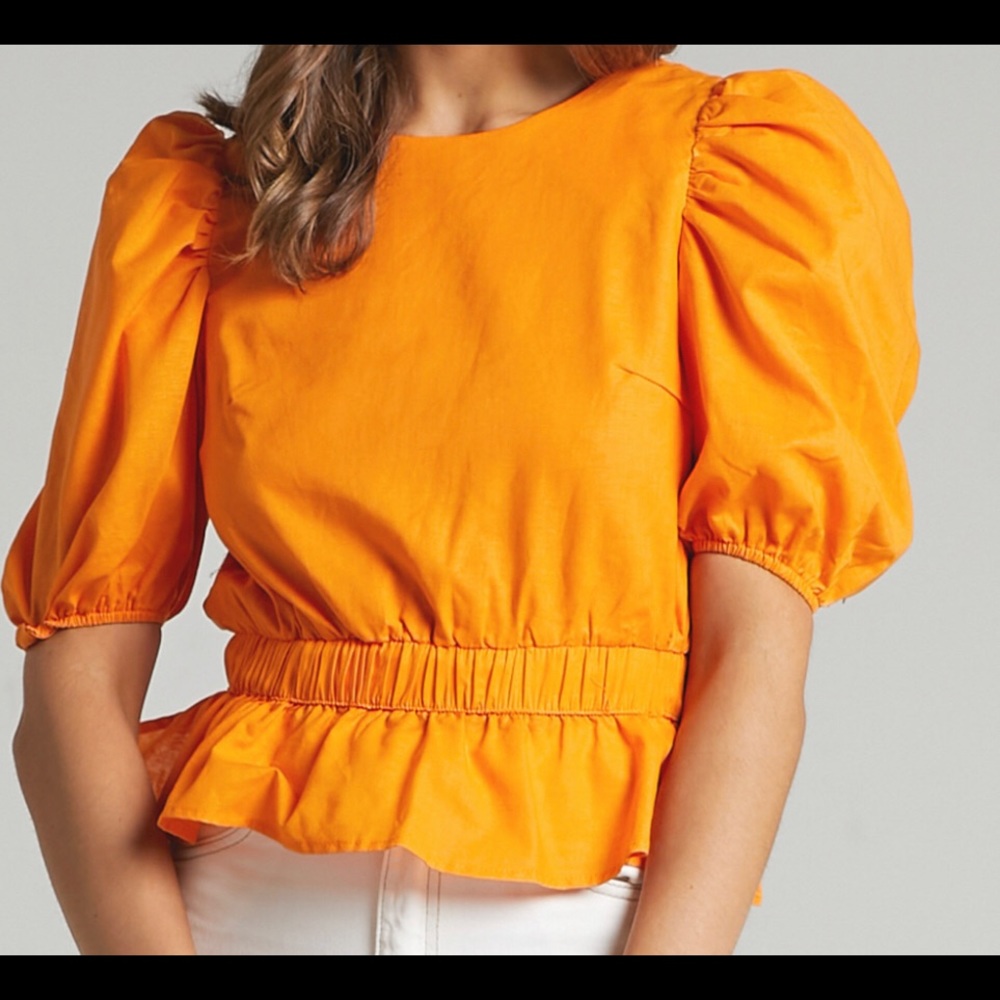 Beautiful orange open back top from ShowPony. New. Only tried on.